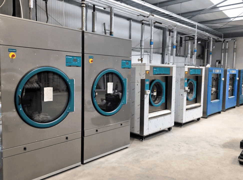 Industrial laundry facility with washing machines